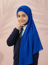 Child wearing a blue hijab and school uniform on a beige background