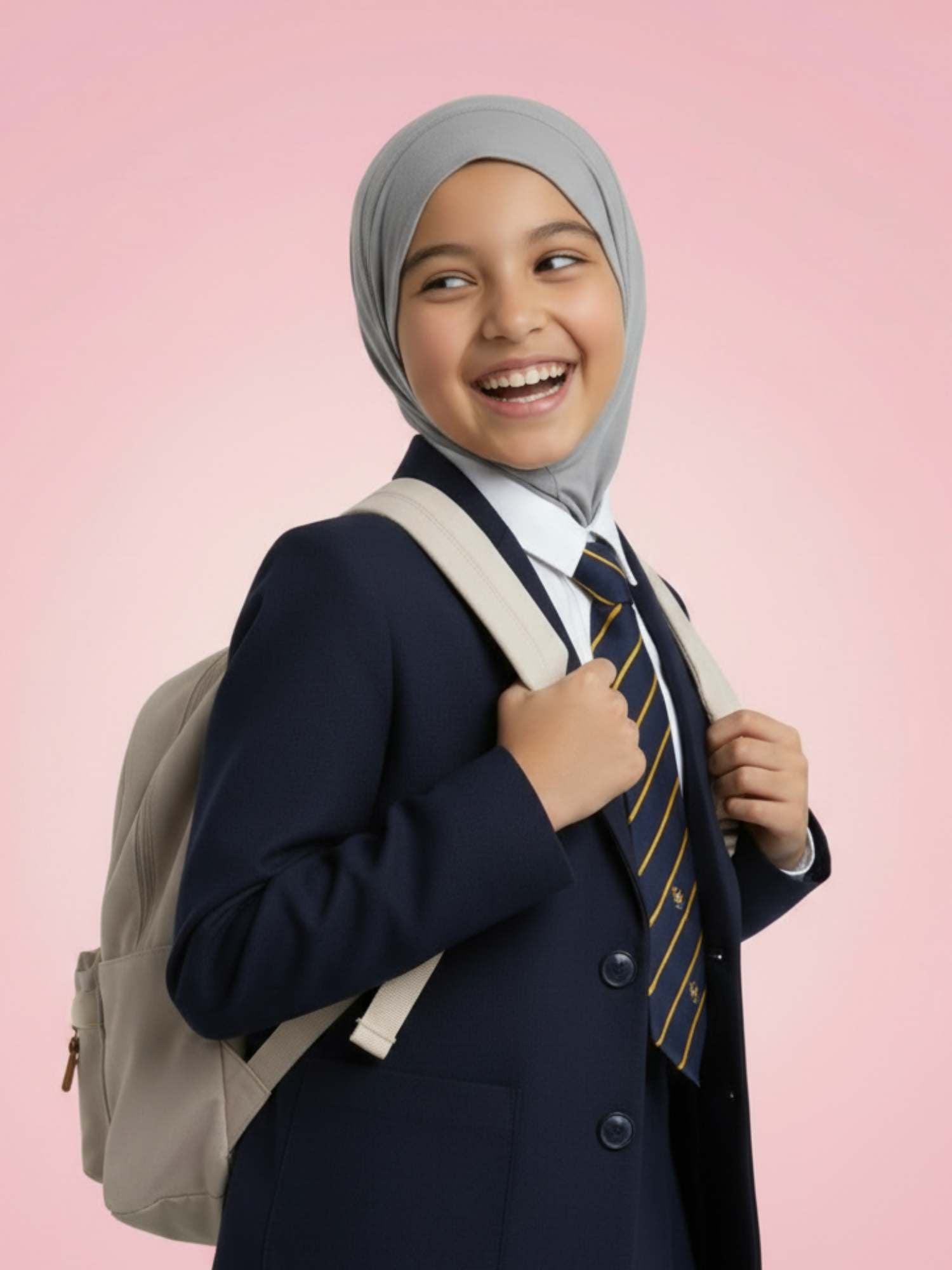 Child in a school uniform with a backpack against a pink background