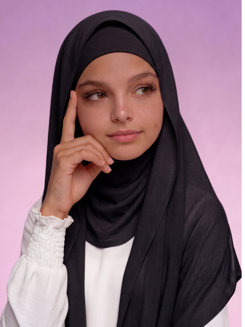 Girl wearing the Midnight Bell black instant hijab for girls, front view