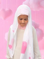 Girl wearing Chibi Sweetheart modal instant hijab with pastel heart print
