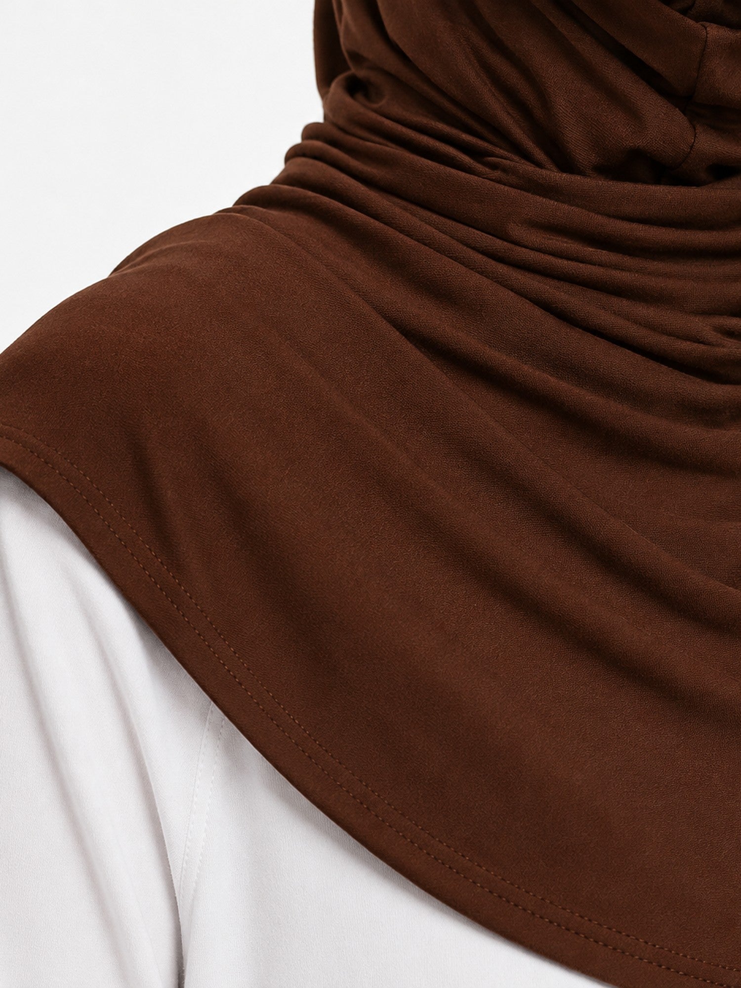 Close up of the dark brown cotton jersey fabric and gathered drape of the FitWrap hijab