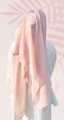 Back view of the FeatherLite instant hijab for girls in peach, showing full coverage
