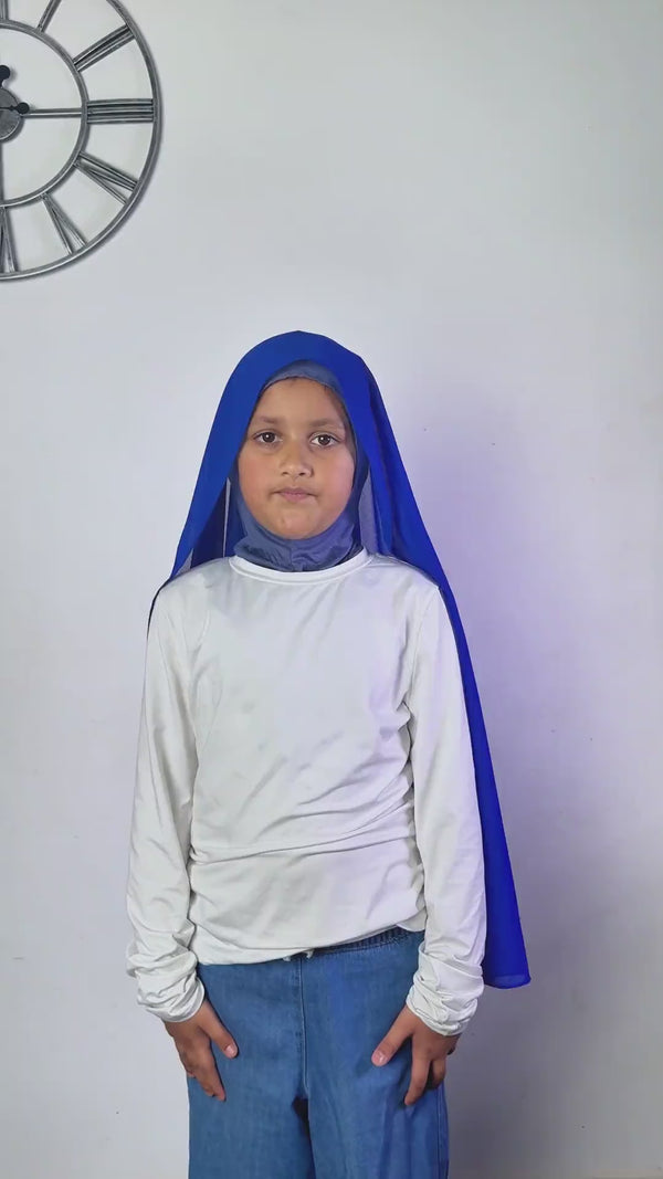A girl wearing the FeatherLite instant hijab, the georgette layer settled over the fitted undercap